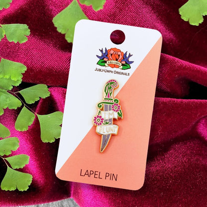 Jubly_Umph_im_blunt_lapel_pin_on_card