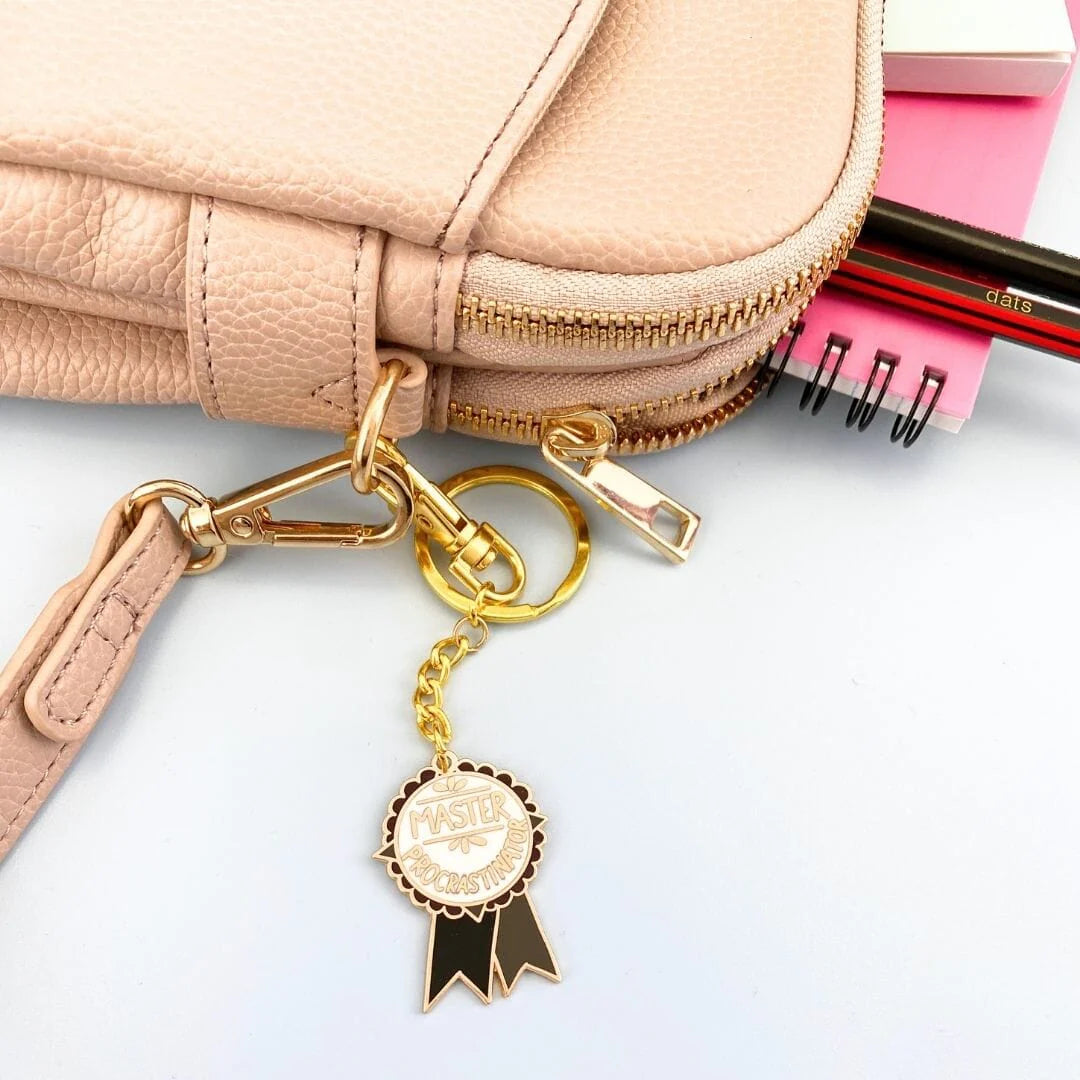 Jubly_Umph_keychain_maseter_procrastinator_on_bag