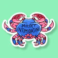 Sticker with a cartoon crab and text on a light green background