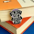 Jubly_Umph_reject_the_status_quo_lapel_pin_book