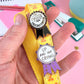 Jubly_umph_Up_And_Not_Crying_Lapel_Pin_on_strap
