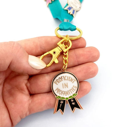 Jubly_umph_keychain_proficient_in_profanities_in_hand