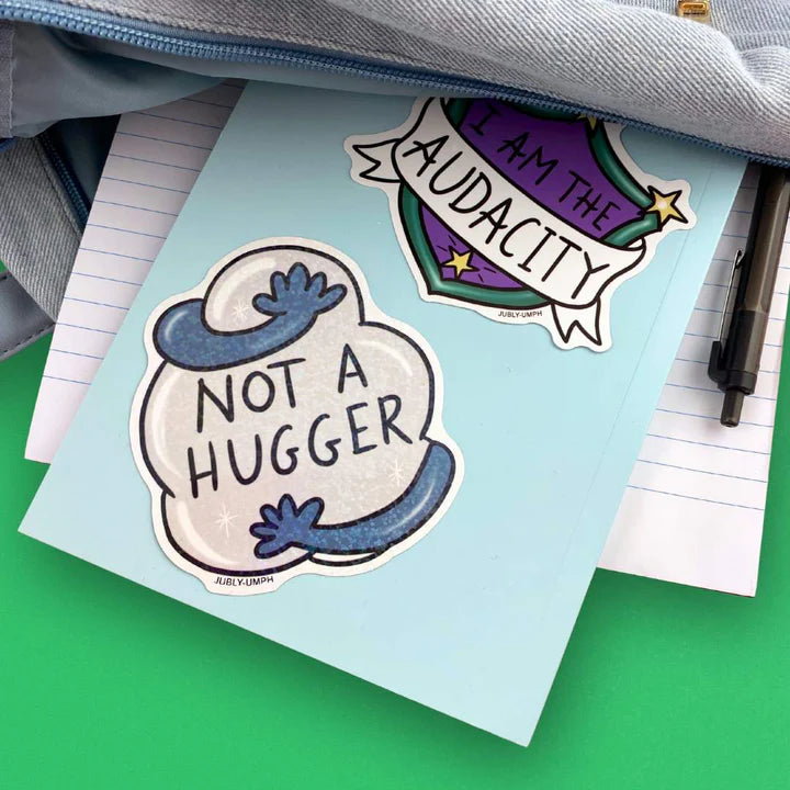Jubly_umph_sticker_not_a_hugger_on_book
