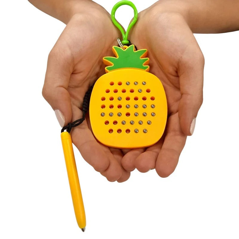 Kaiko_Pineapple_magnetic_pad_keyring_in_hand