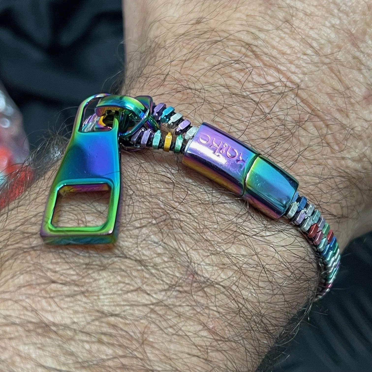 Kaiko_fidgets_Unisex_Oil_Slick_Metal_Zipper_Bracelet_on_hairy_wrist
