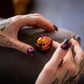 Kaiko_fidgets_gyroscope_oil_slick_in_spin