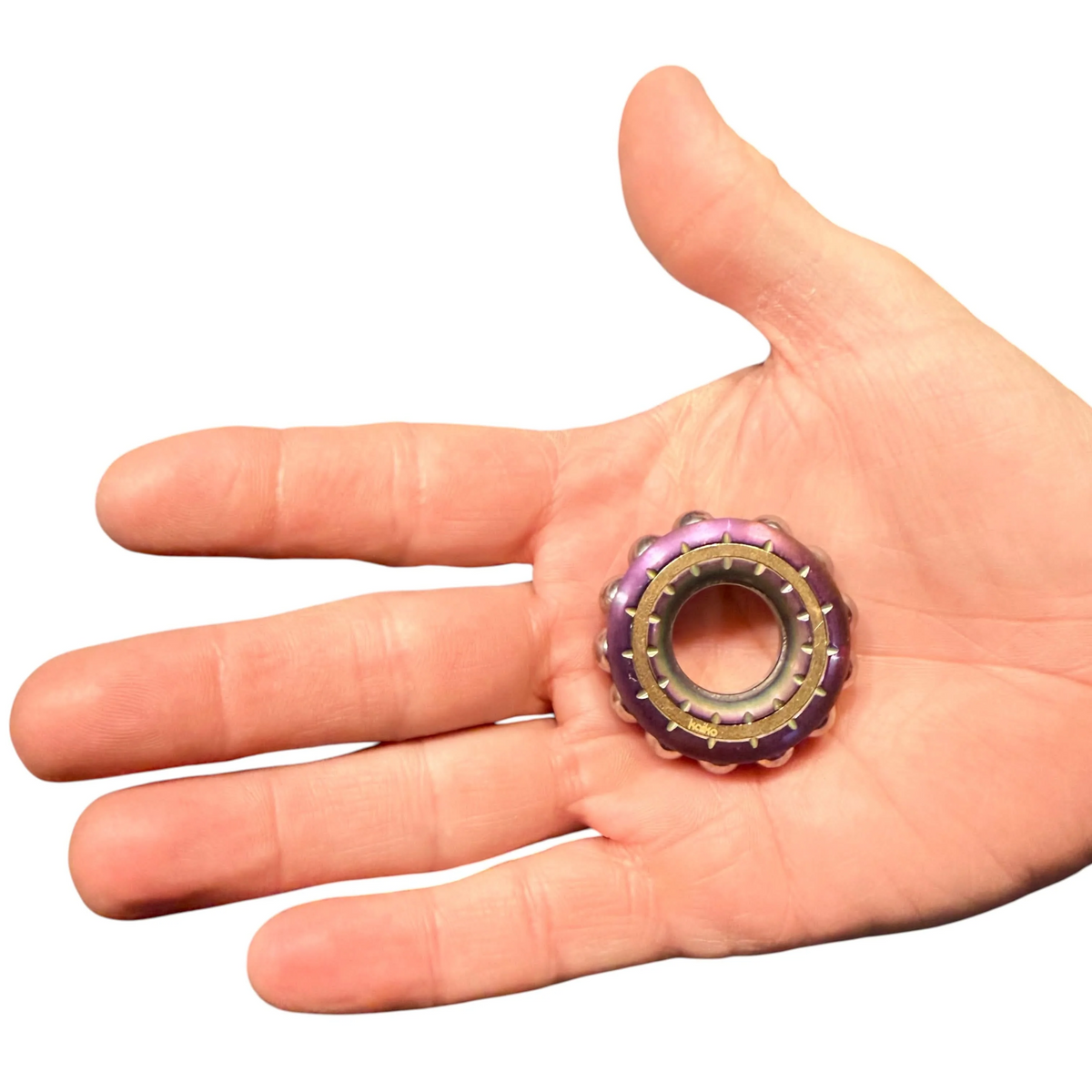 Freewheel Spinner – Oil Slick Metal Sensory Tool by Kaiko