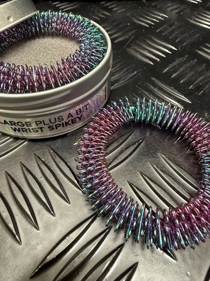 Kaiko_wrist_spikey_oil_slick_self_harm_tool_large_plus_a_bit