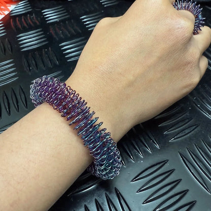 Kaiko_wrist_spikey_oil_slick_self_harm_tool_with_spikey_ring