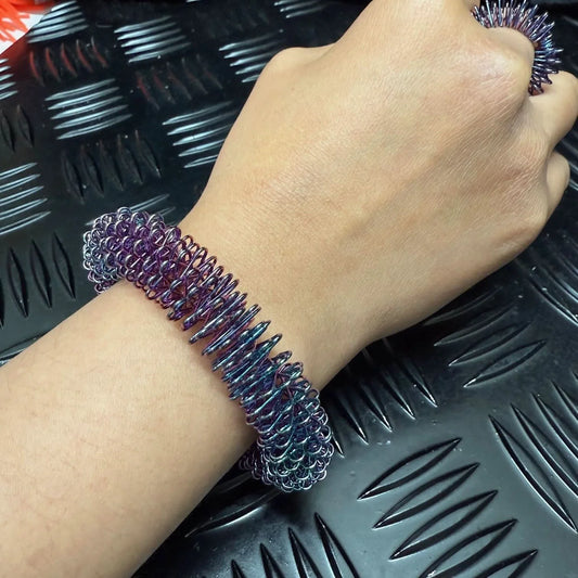 Kaiko_wrist_spikey_oil_slick_self_harm_tool_with_spikey_ring