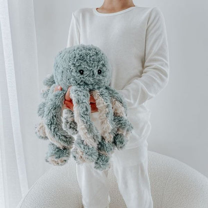 Mindful_and_Co_Kids_Calming_weighted_Animal_buddie_Ollie_the_Weighted_Octopus_being_held