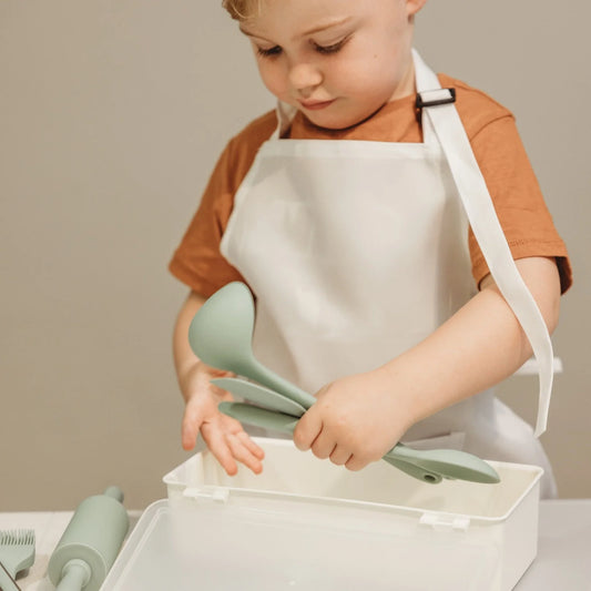 Montessori_Mates_Silicon_Cooking_green_boy_using_tools
