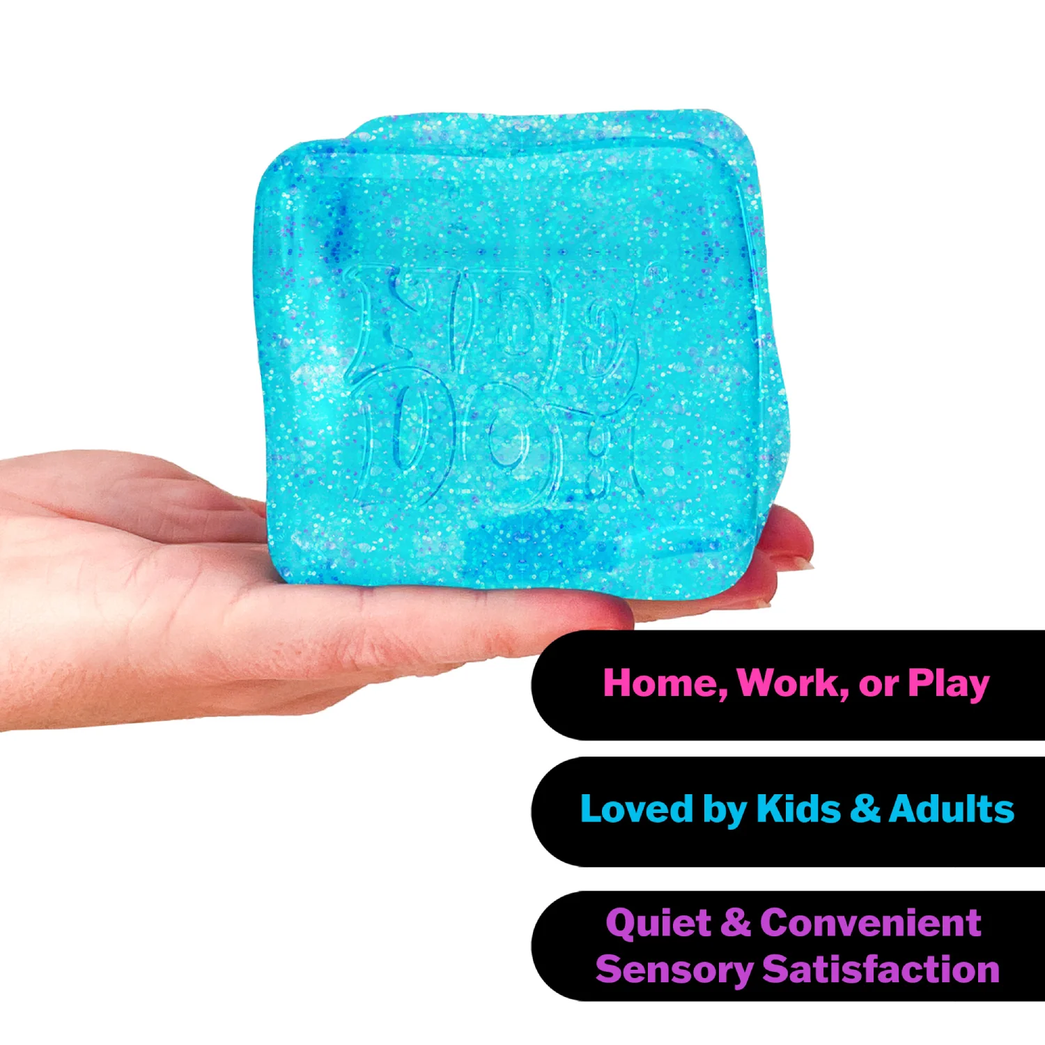 Blue square object held in a hand with text about its uses and benefits on a white background. Needoh_Nice_Berg_Glitter_and_Glow_on_hand