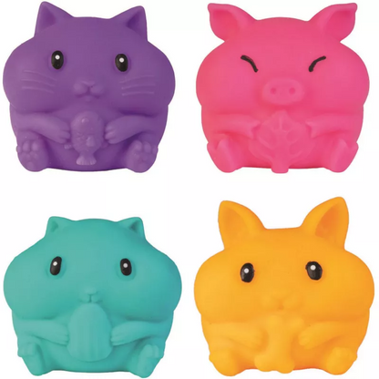 Four colorful animal-shaped rubber stamps on a white background. SQUEEZEY_CRUNCHY_PETS_scute_little_critters