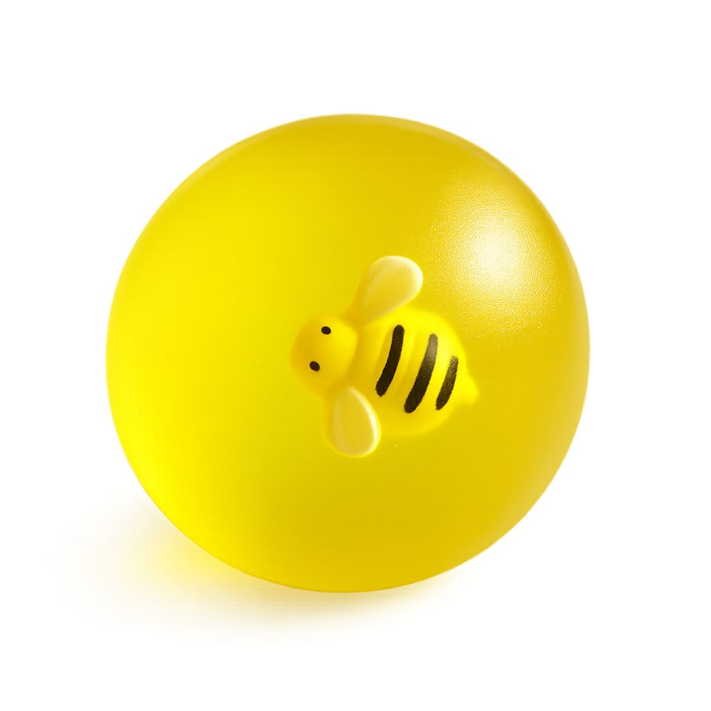 Yellow ball with a bee design on a white background. SQUEEZE_HONEY_BEE_DROP_bee