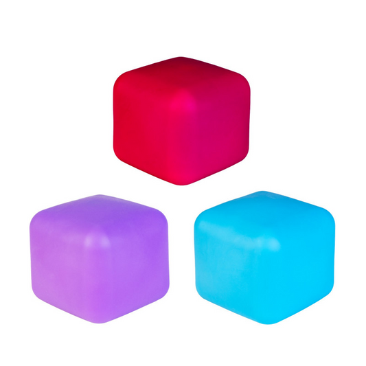 Three colorful cubes (red, purple, blue) on a white background