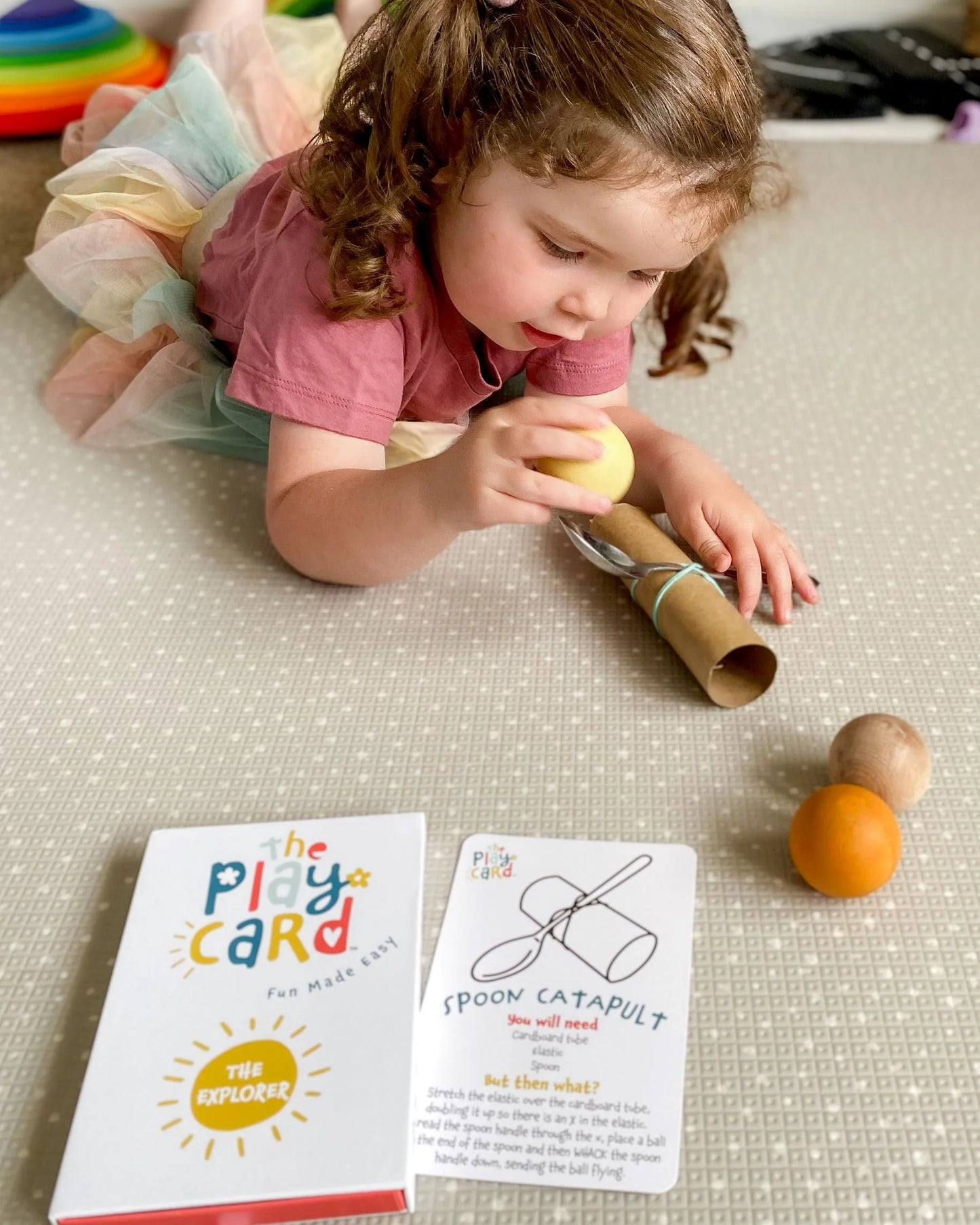 The_Play_Card_The_Explorer_Age_4_plus_girl_playing