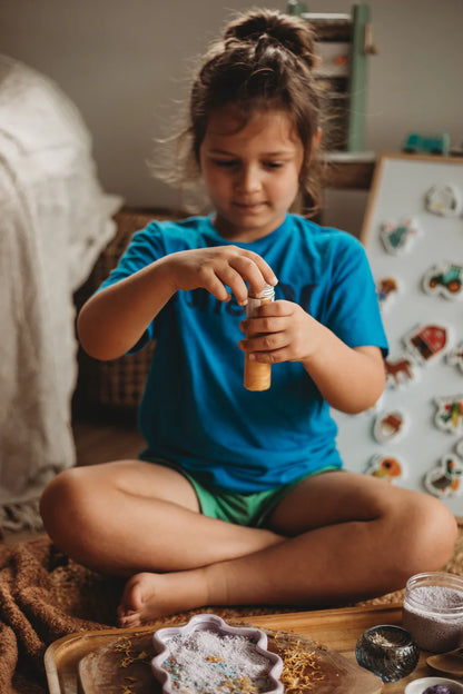 The_Saltwater_Collective_Golden_Summer_Mystical_Water_Potion_Activator_Bottle_girl_playing_with_potion
