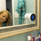 Time_Timer_stuck_to_mirror_being_used_by_child