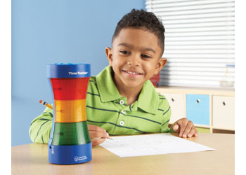 Time_Tracker_boy_sitting_at_table_using