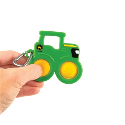 omy_simpl_dimpl_tractor_in_persons_hand
