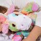 Warmies_Rainbow_unicorn_with_girl_sleeping