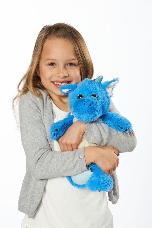 Warmies_blue_dragon_being_cuddled_by_young_girl