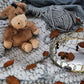 Warmies_donkey_sitting_on_blanket