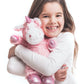 Warmies_pink_unicorn_being_cuddled_by_young_girl