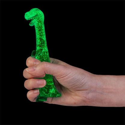 fidget_smoosho_s_super_glow_in_the_dark_stretchy_dino_IN_HAND