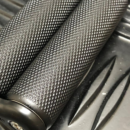 kaiko_fidgets_black_textured_mini_hand_roller_in_persons_hand