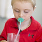 Boy_drinking_from_cup_through_a_straw_using_ARK'S_LIP_BLOK_MOUTHPIECE 