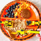 Construction_plate_with_food_and_cutlery_on_top