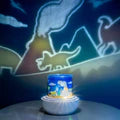 Lumi_go_round_sensory_projector_lamp_dinosaur_theme_projected_on_wall