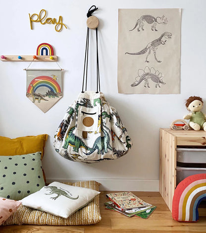 Play_pouch_Large_Dino_Roar_hanging_on_a_hook_on_bedroom_wall