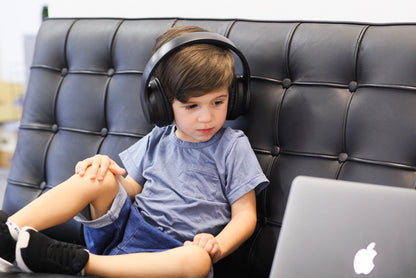 Ems_FOR_KIDS_Blue_Tooth_Head_Phones_CHILD_ON_COUCH