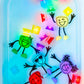 Glo_Pals_tub_of_brightly_coloured_glo_pal_cubes_and_characters_in_sensory_tub