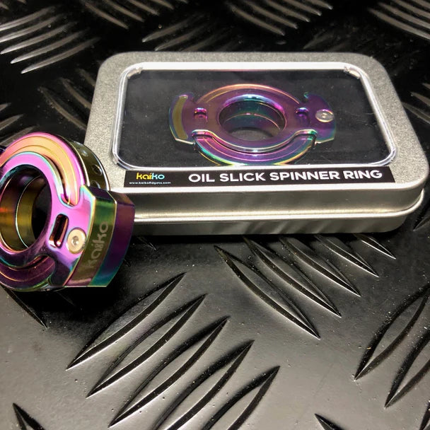 Kaiko-oil-slick-spinner-ring_in_box