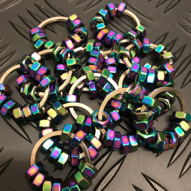 Kaiko_Hexa_oil_slick_XL_large_pile_on_metal_background