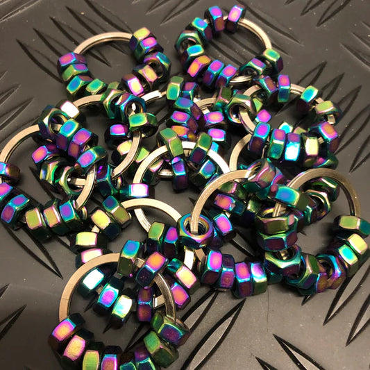 Kaiko_Hexa_oil_slick_XL_large_pile_on_metal_background
