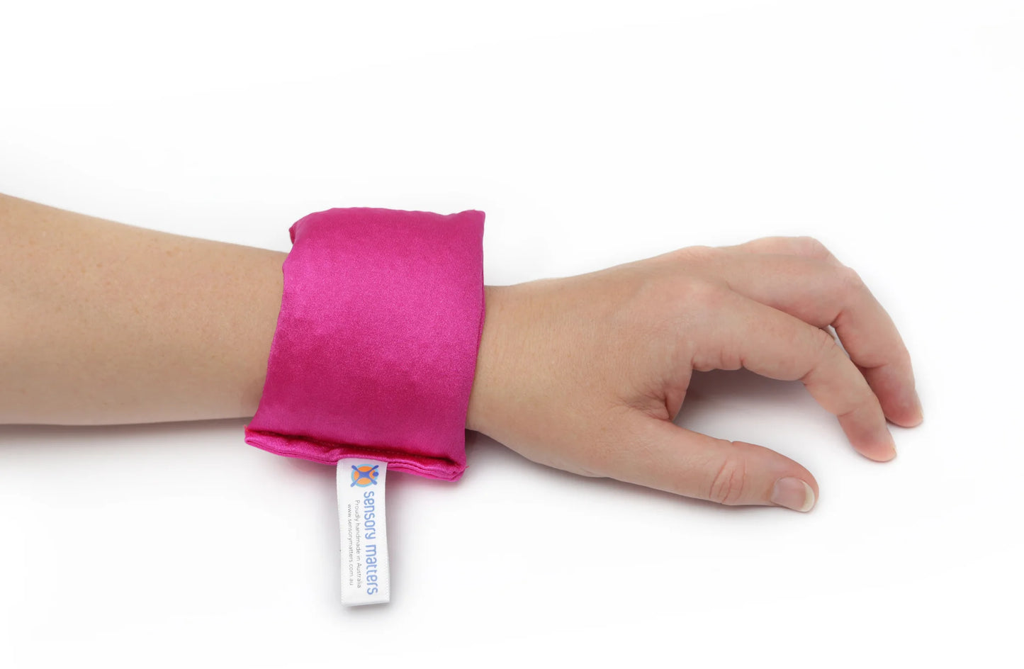 Sensory_Matters_Lycra-fidget-cuff-pink_on_persons_wrist