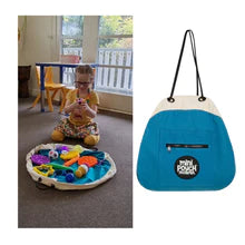 Mini_Play_Pouch_play_pouches_girl_sitting_playing_with_toys_in_the_pouch_on _floor