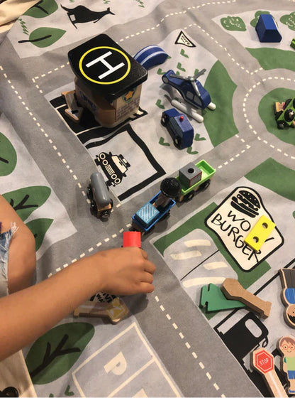 Play_pouch_Wow_Town_interactive_toy_pouch_kids_playing_on_mat_with_transport_vehicles