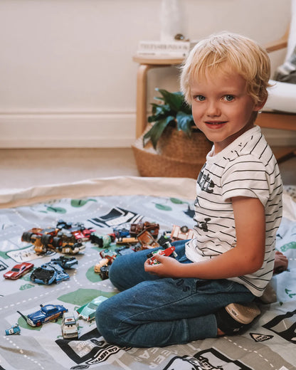 Play_pouch_Wow_Town_interactive_toy_pouch_child_playing_on_mat