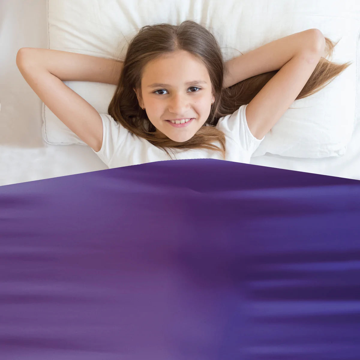 girl_tucked_into_bed_in_Calmcare_Purple_Sensory_Compression_Bed_Sheet