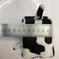 Senseez_hand_held_draw_cord_pull_vibrating_massager_cow_next_to_ruler_seven_centimeters_wide