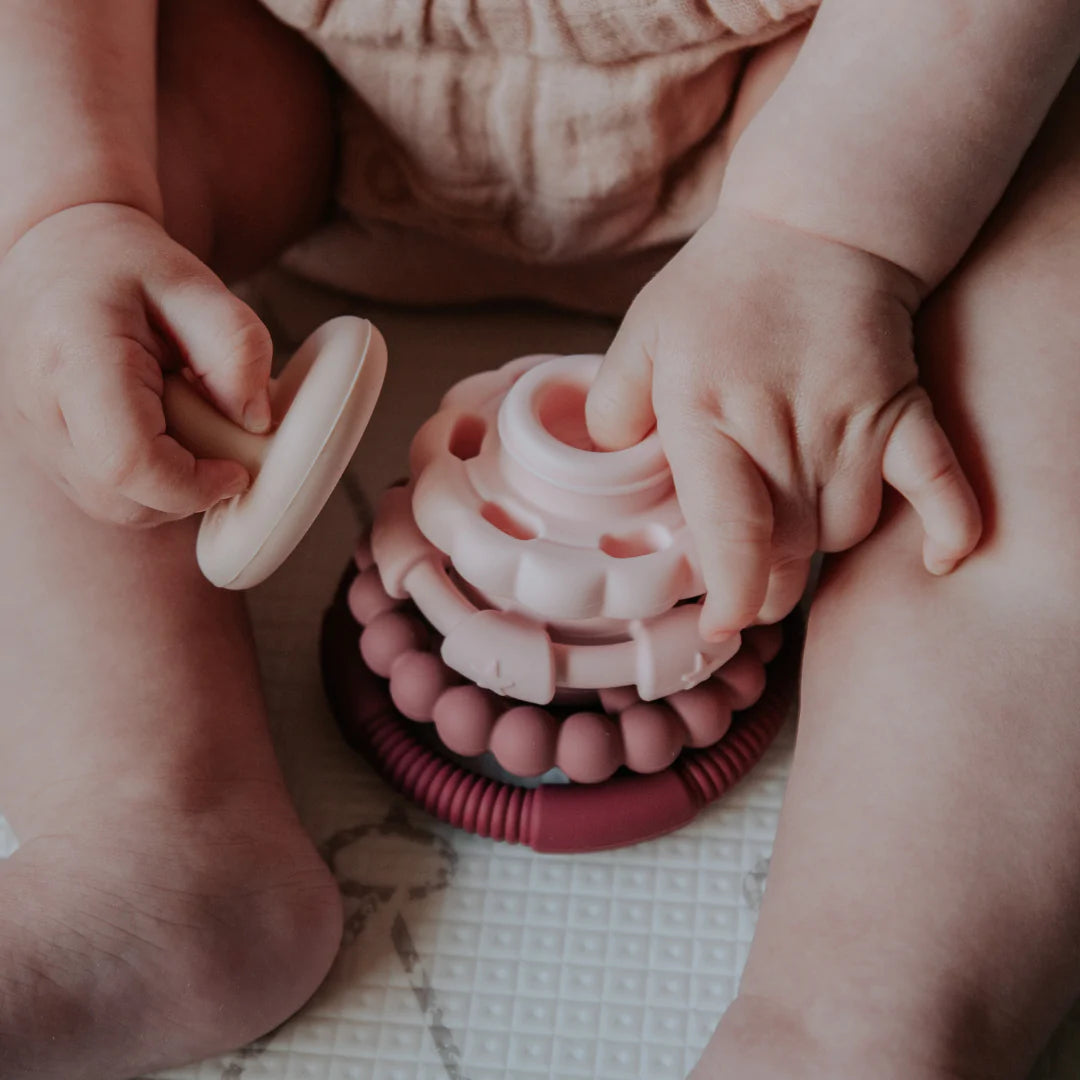 Baby_playing_with_Jelly_Stone_Designs_Rainbow_Stacker_and_Teether_Toy_Dusty