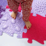 Muffik_sensory_play_mat_medium_size_pink_child_feet_walking_on_tiles
