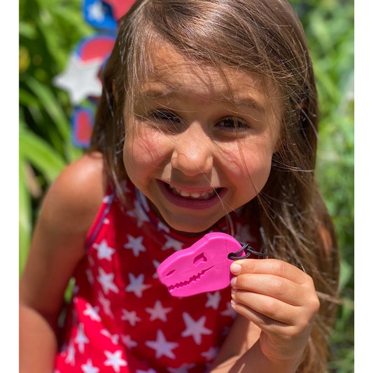Ark_dino_bite_girl_wearing_hot_pink_chew