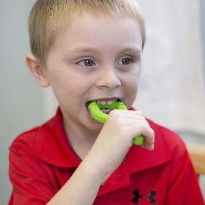 Boy_chewing_Arks_textured_grabber_Sensory_chew